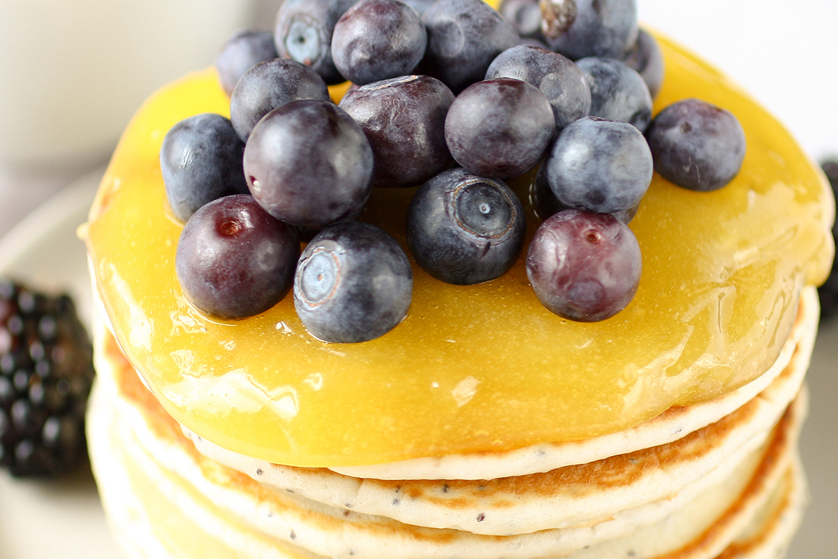 close up of lemon poppy seed pancakes