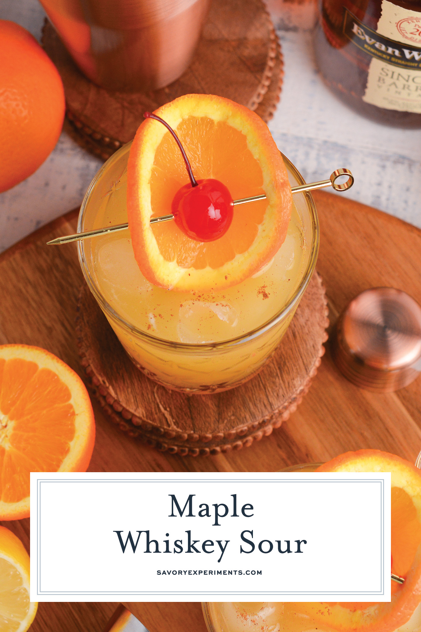 angled shot of maple whiskey sour with text overlay