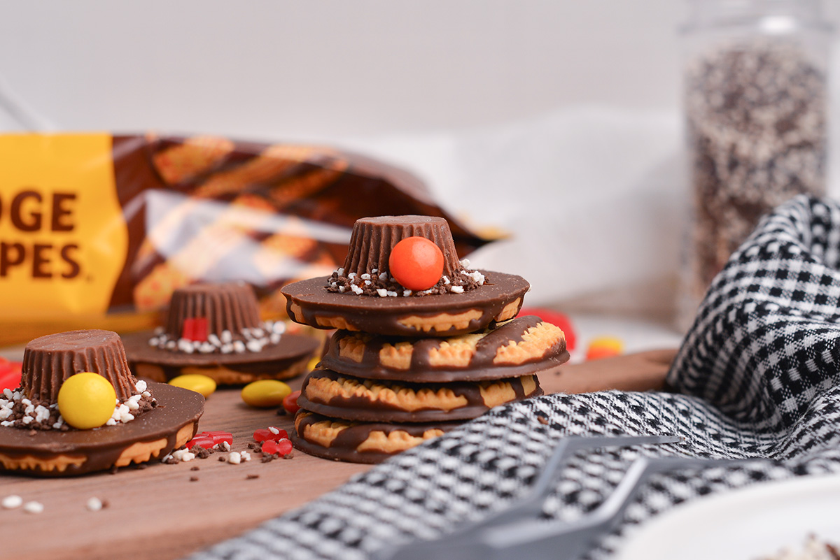 straight on shot of stack of pilgrim hat cookies