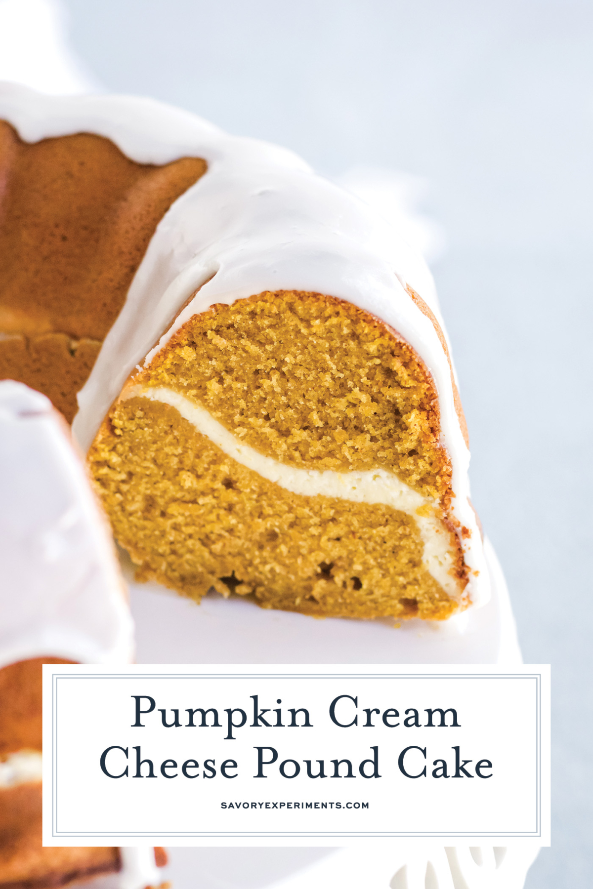 angled shot of sliced pumpkin cream cheese pound cake with text overlay