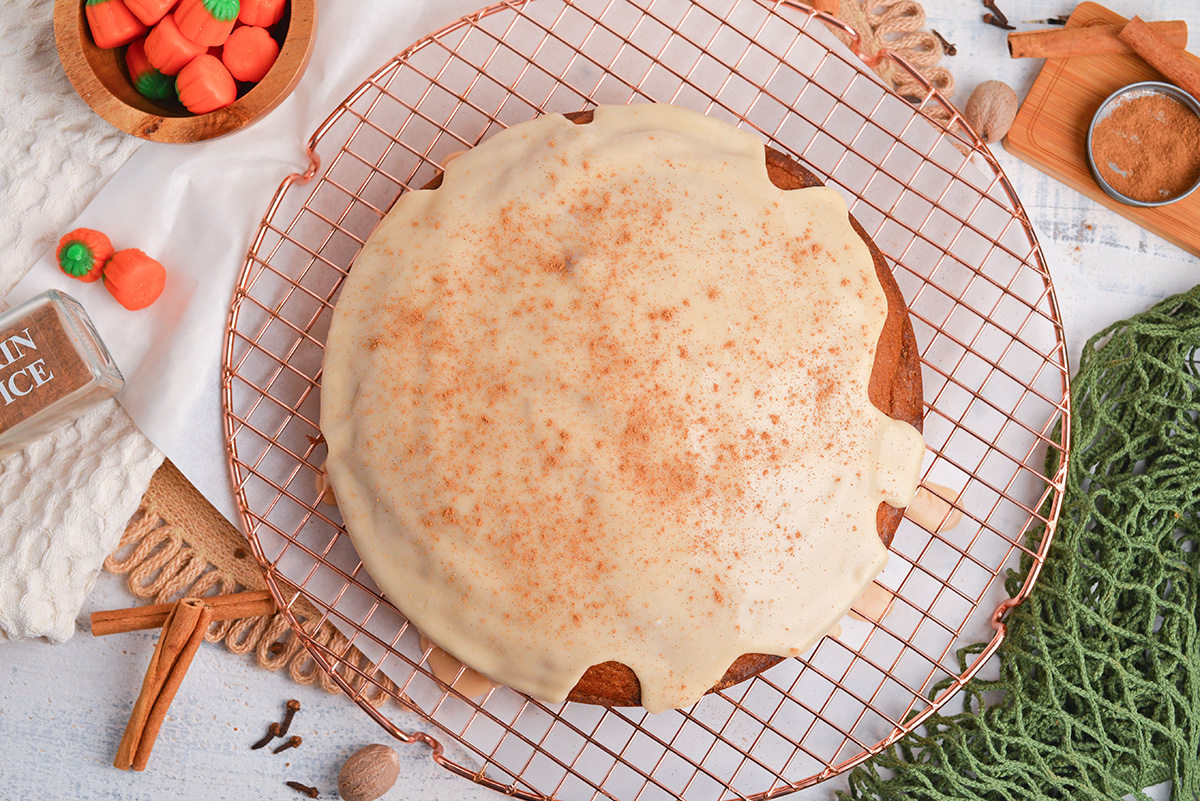 overhead shot of pumpkin olive oil cake topped with maple glaze