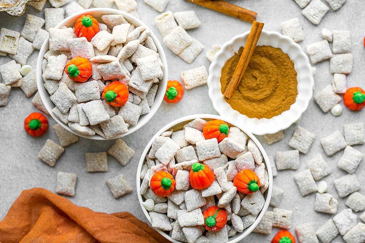 overhead shot of two bowls of pumpkin spice puppy chow