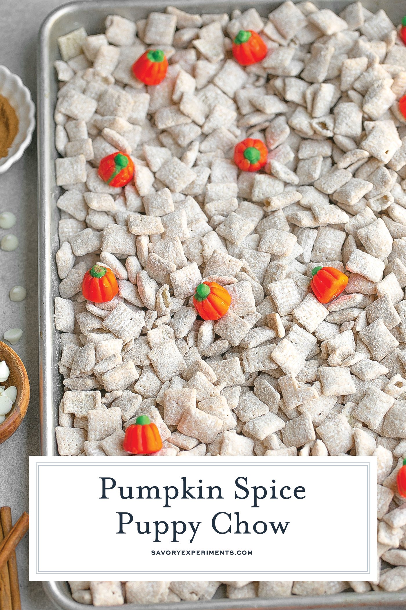 overhead shot of sheet pan of pumpkin spice puppy chow with text overlay