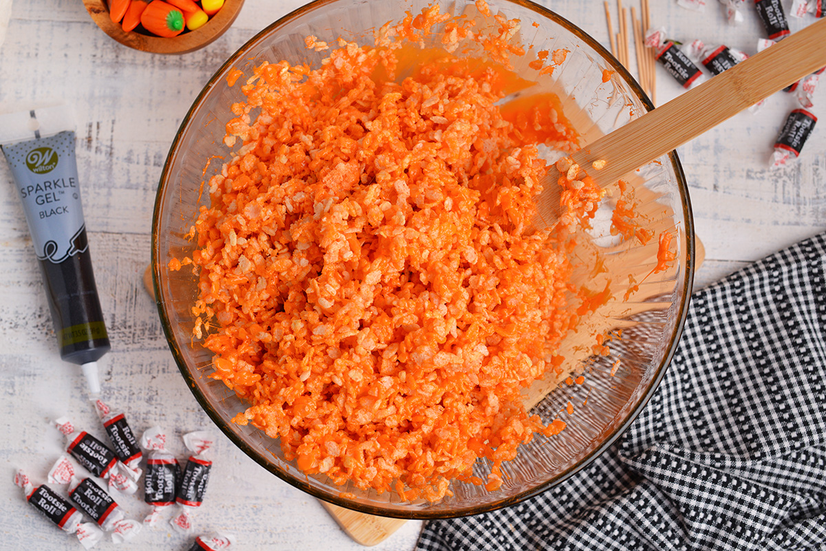 overhead shot of orange rice krispies in a bowl