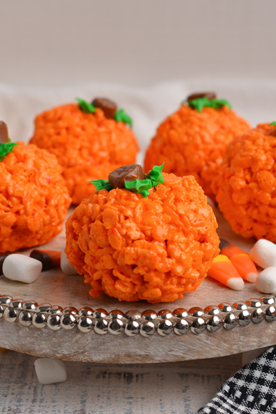 rice krispie pumpkins on a tray