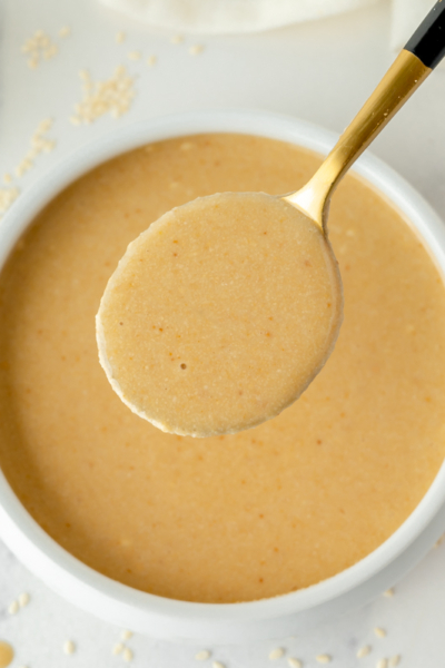 overhead shot of spoon of tahini