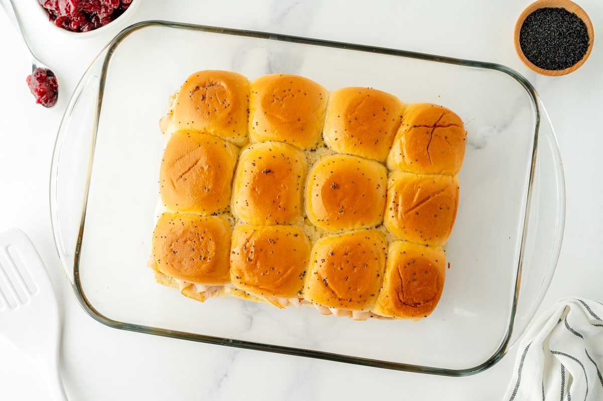 overhead shot of turkey cranberry sliders in baking dish