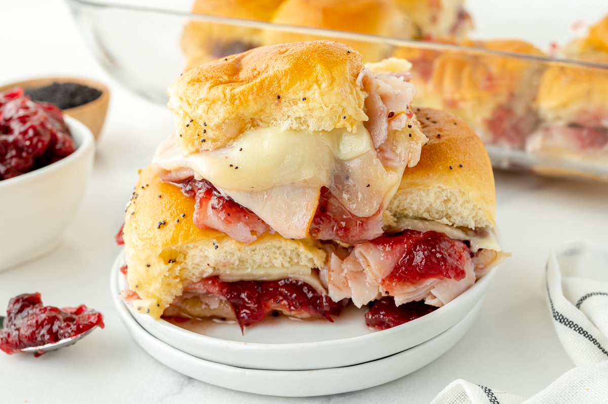 angled shot of stack of cranberry turkey sliders