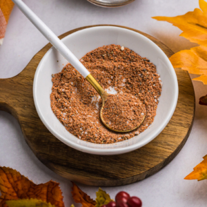 angled shot of spoon in bowl of turkey seasoning