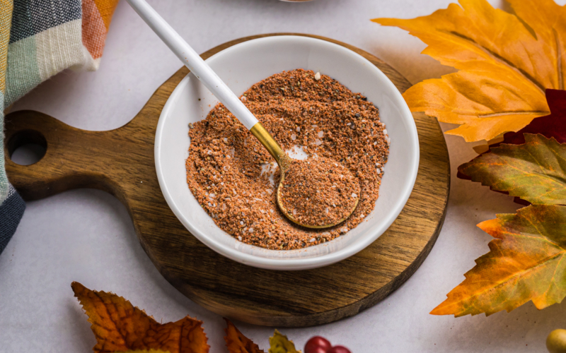 angled shot of spoon in bowl of turkey seasoning