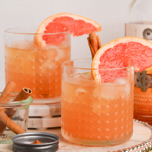 straight on shot of two whiskey grapefruit cocktails