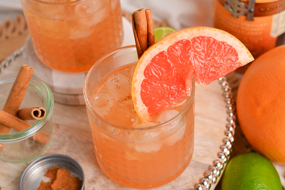 close up angled shot of two whiskey grapefruit cocktails