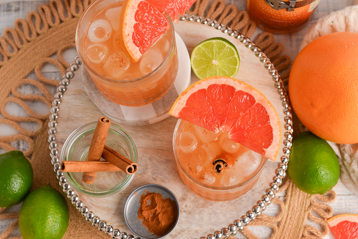 overhead shot of two whiskey grapefruit cocktails