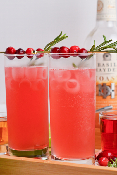 straight on shot of two cranberry whiskey sours