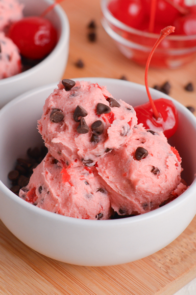 angled shot of bowl of cherry cookie dough