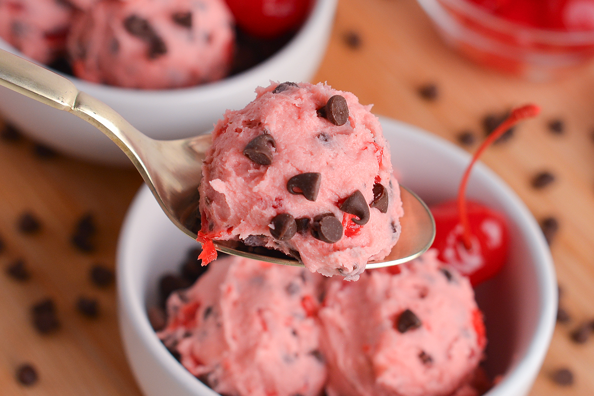 close up of scoop of cookie dough on spoon