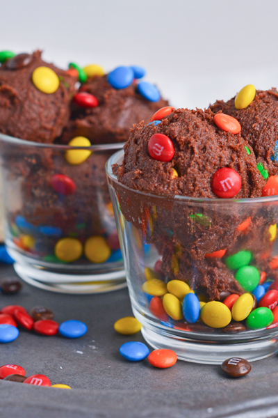 two glass bowls of chocolate edible cookie dough