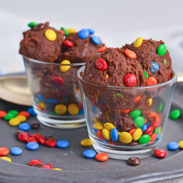 two glass bowls of chocolate edible cookie dough