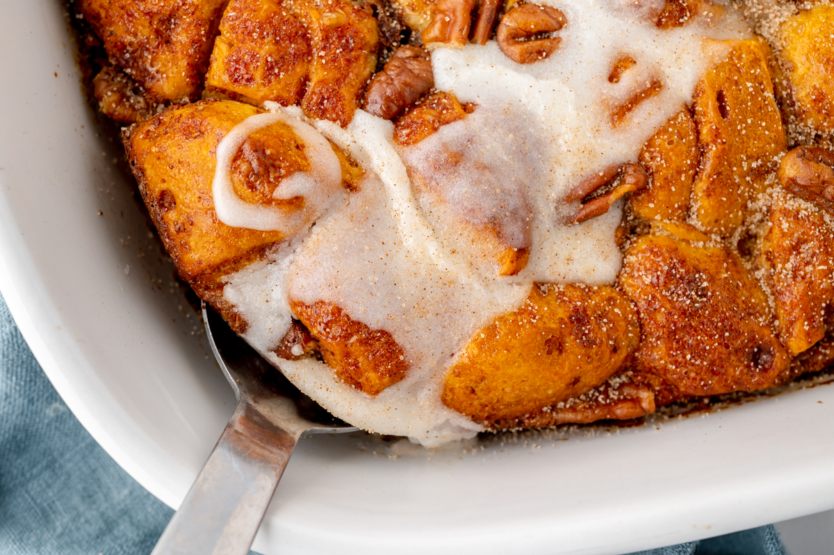 overhead shot of serving spoon in breakfast casserole