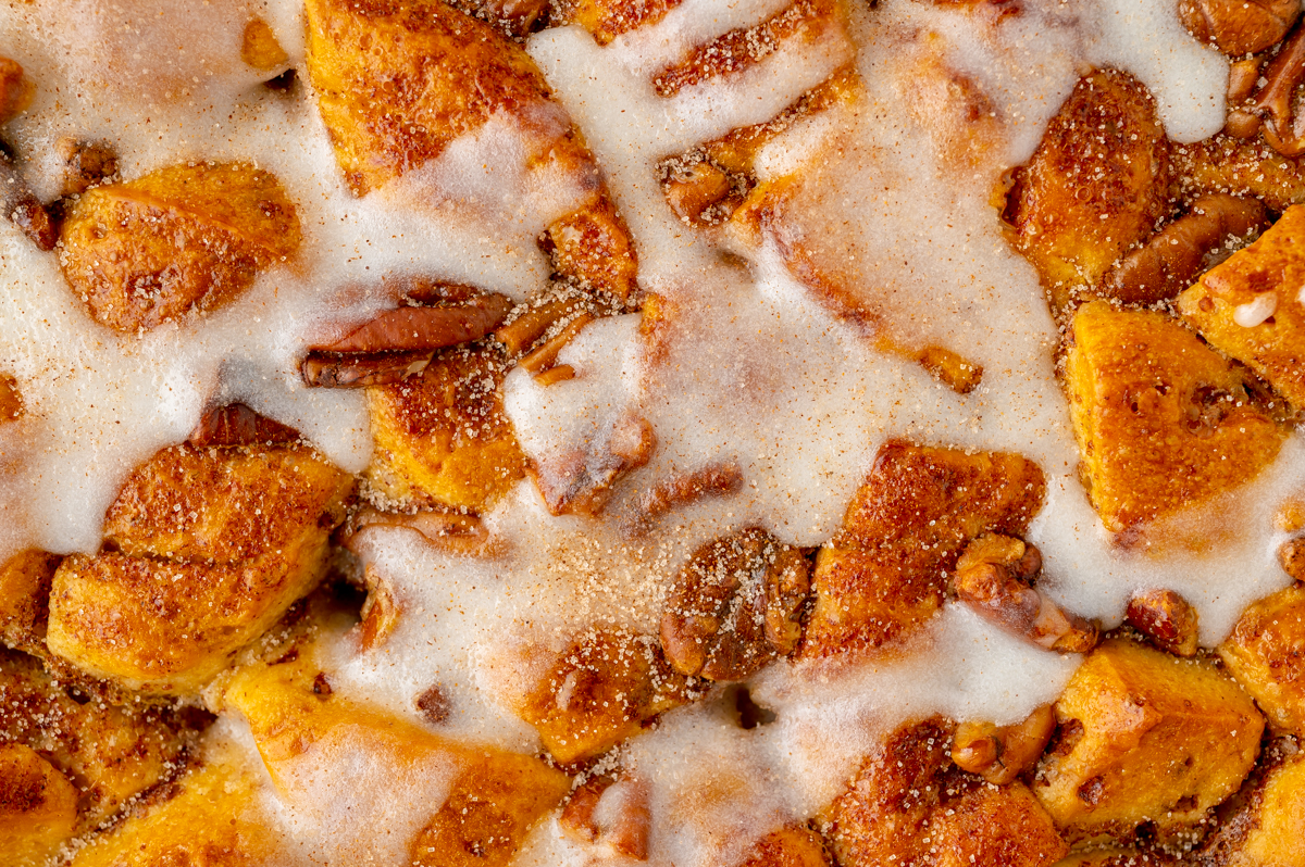 close up overhead shot of cinnamon roll casserole in baking dish