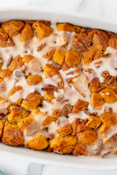 overhead shot of cinnamon roll casserole in baking dish