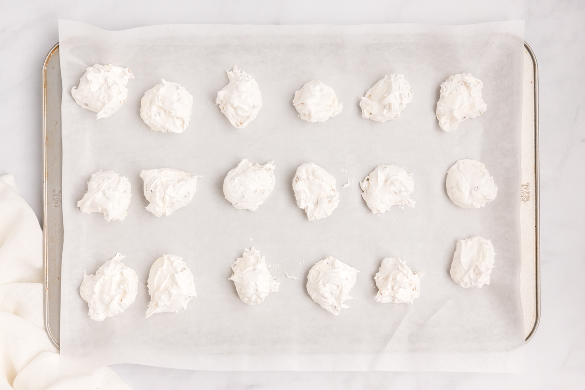 dollops of whipped candy on sheet pan