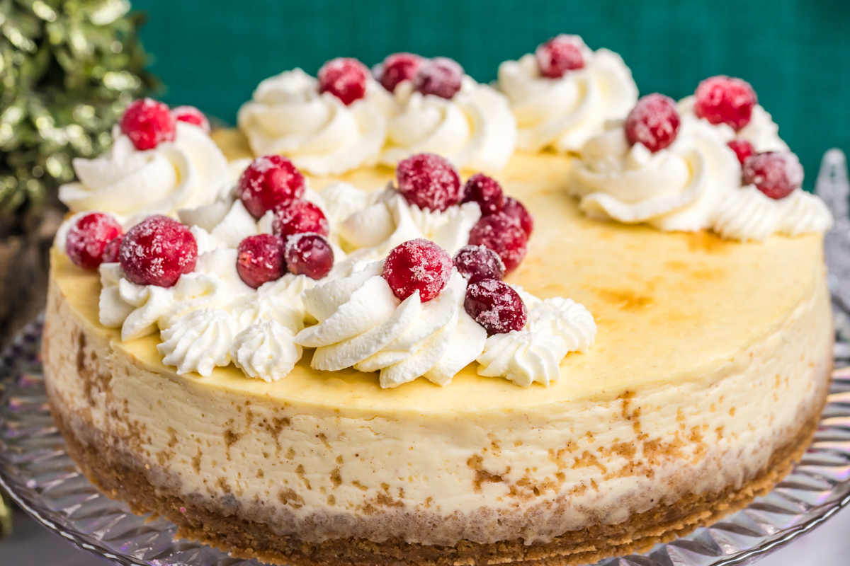 close up angled shot of whole eggnog cheesecake