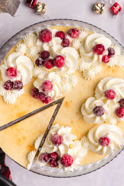 overhead shot of slice cut out of eggnog cheesecake