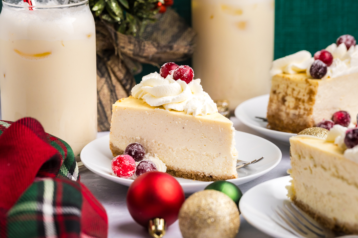 straight on shot of slice of eggnog cheesecake on plate