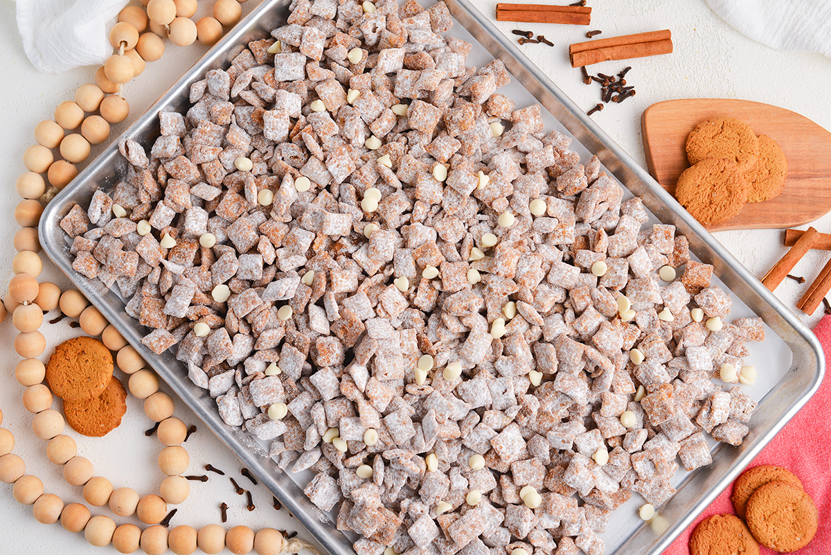 overhead shot of cinnamon puppy chow on baking sheet