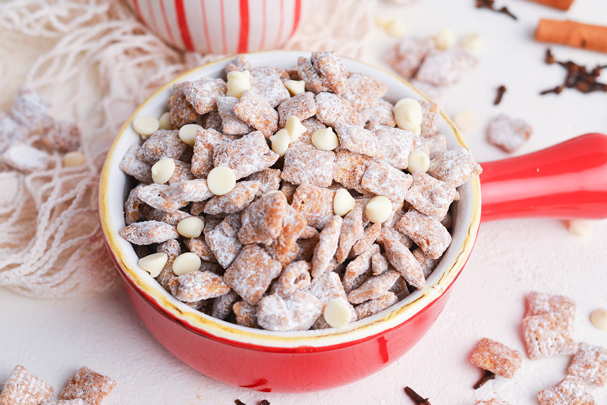 angled shot of bowl of gingerbread puppy chow