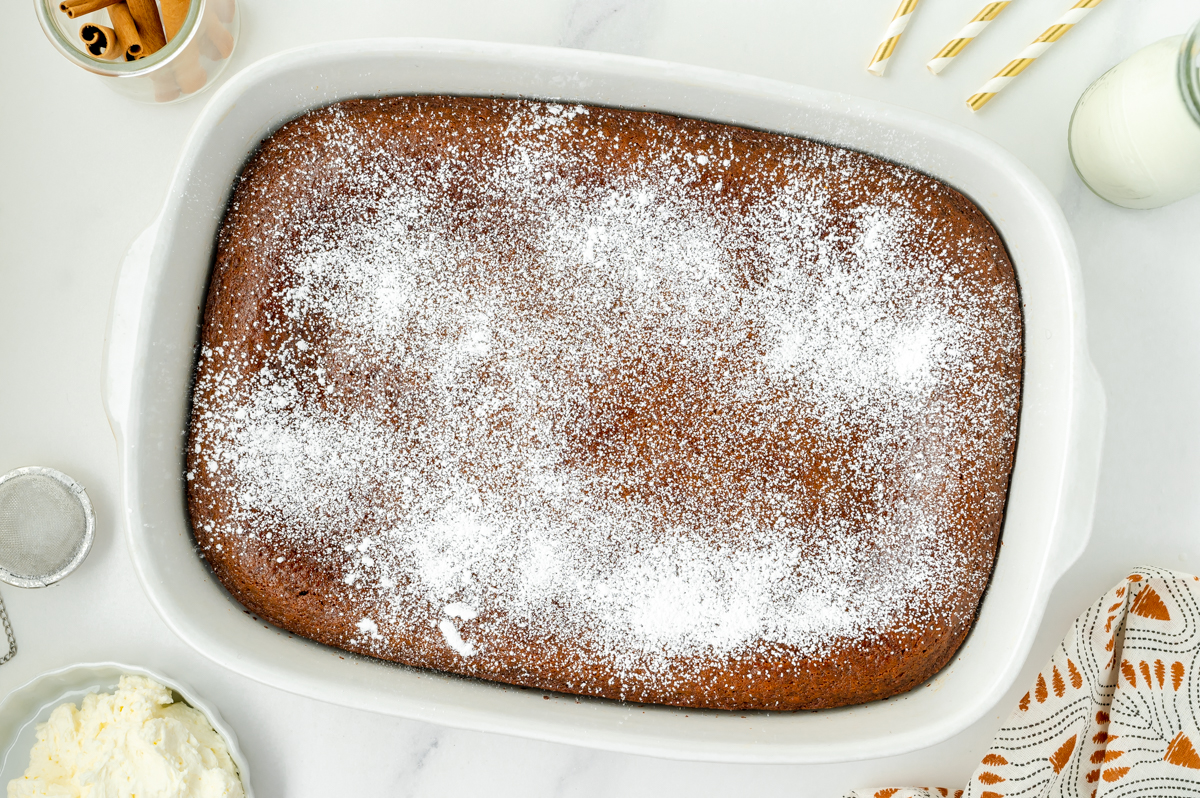 overhead shot of gingerbread snack cake in baking dish