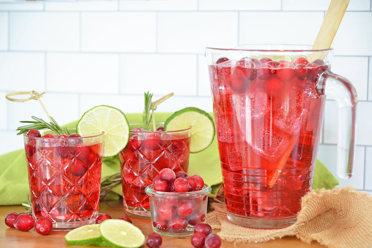 Two glasses and a pitcher of holiday party punch