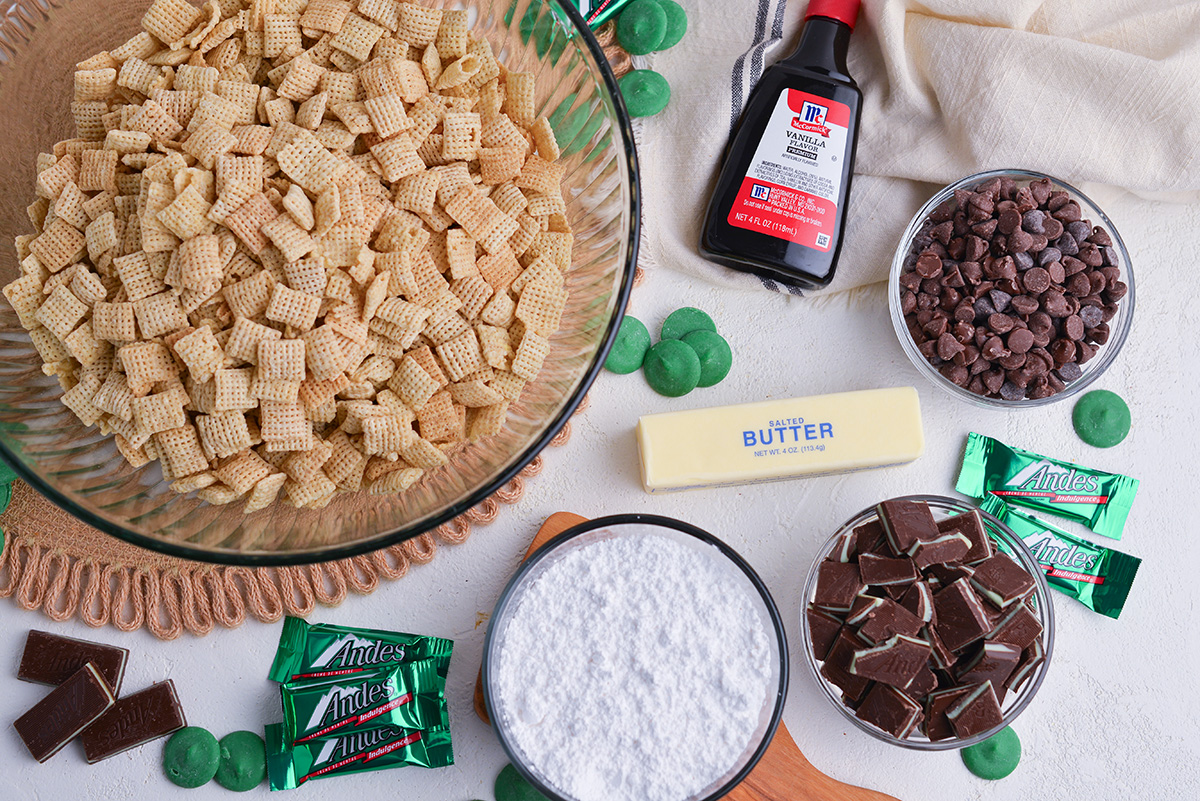 overhead shot of mint chocolate chip muddy buddies ingredients