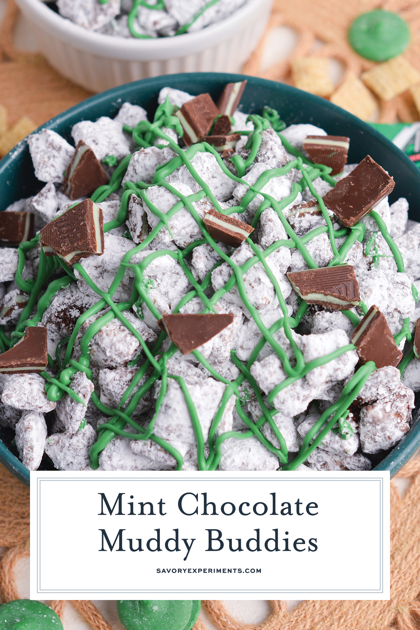 angled shot of bowl of mint chocolate chip muddy buddies