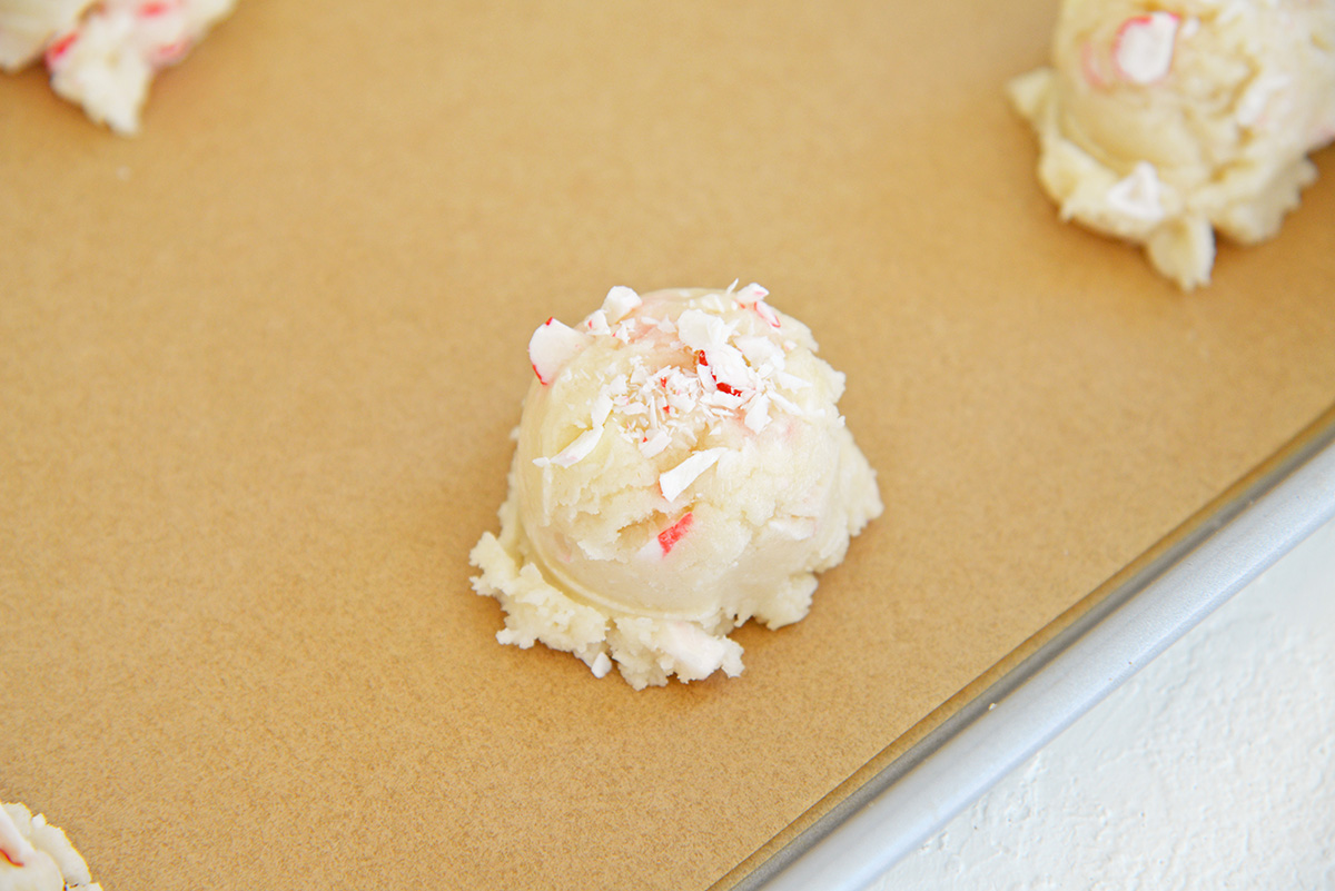 scoop of peppermint cookie dough on sheet pan