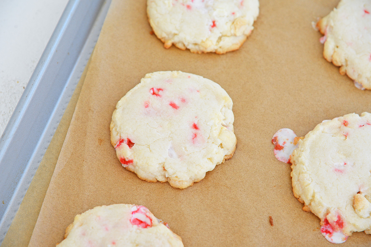 angled shot of baked peppermint cookies on sheet pan