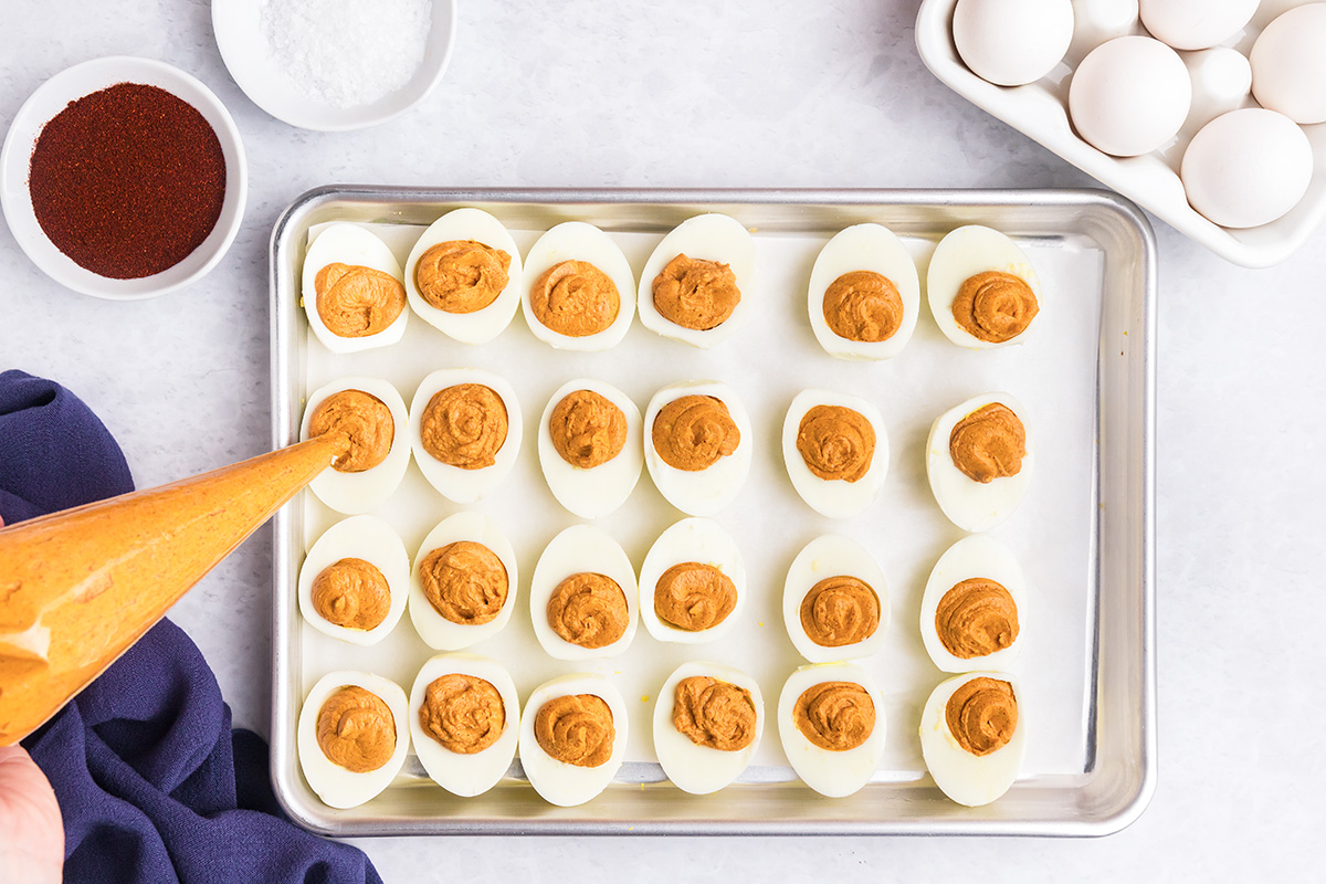 piping bag filling boiled eggs