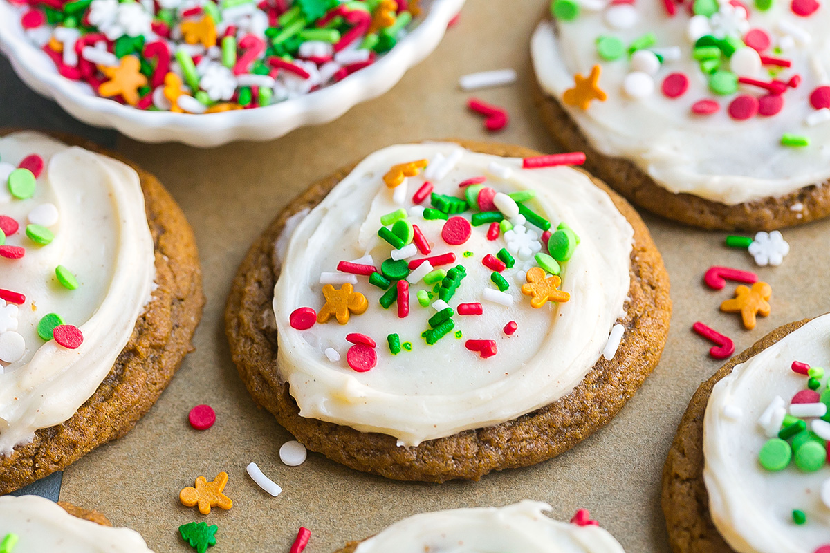 close up angled shot of soft gingerbread cookies on parchment paper