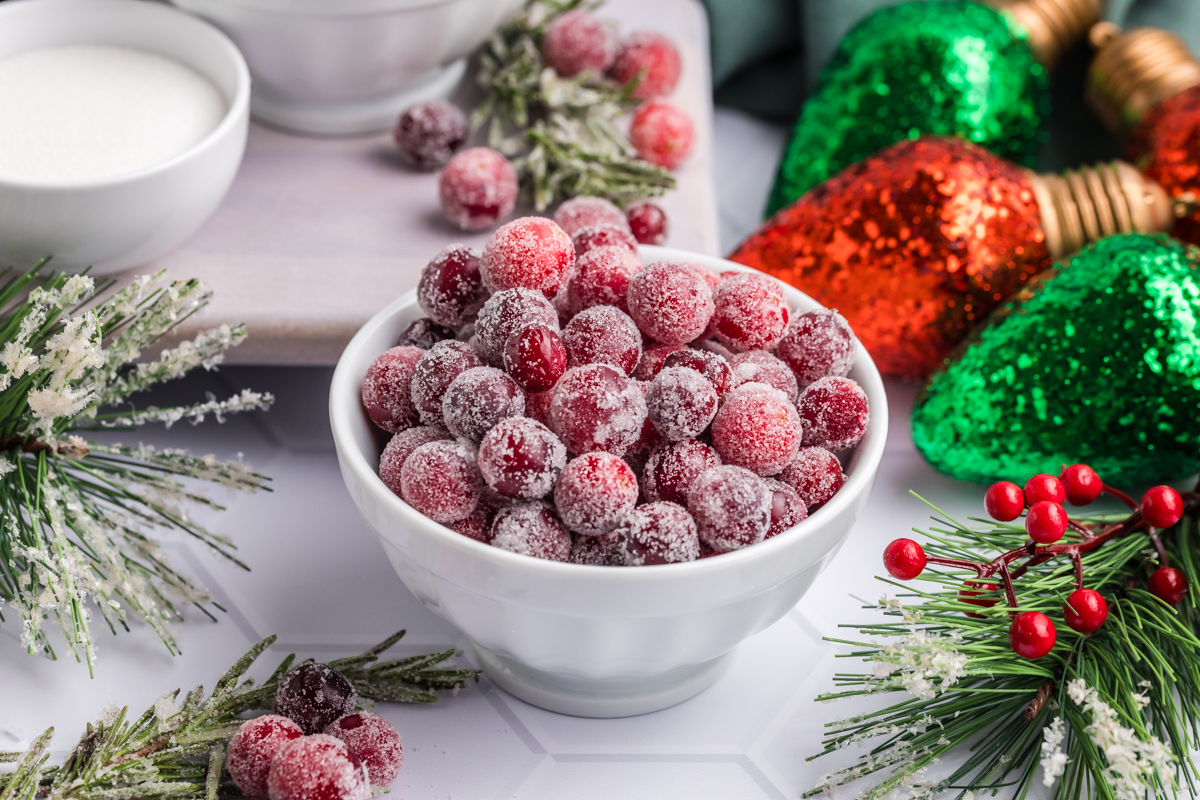 angled shot of bowl of sugared cranberries