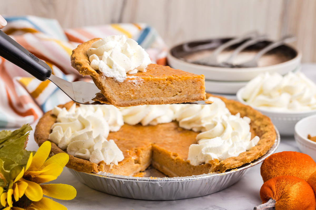 slice of sweet potato pie on spatula