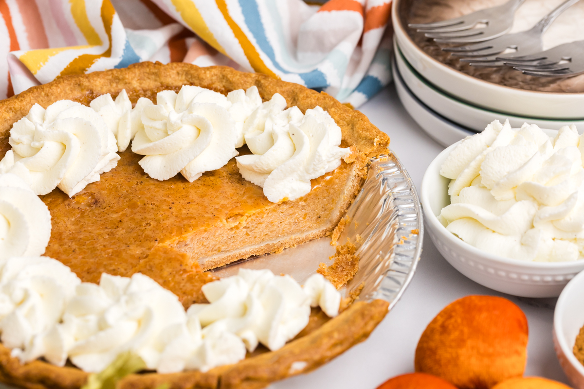 slice taken out of sweet potato pie