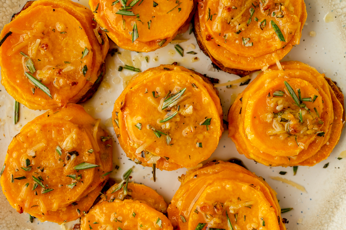 close up overhead shot of plate of stacked sweet potato slices