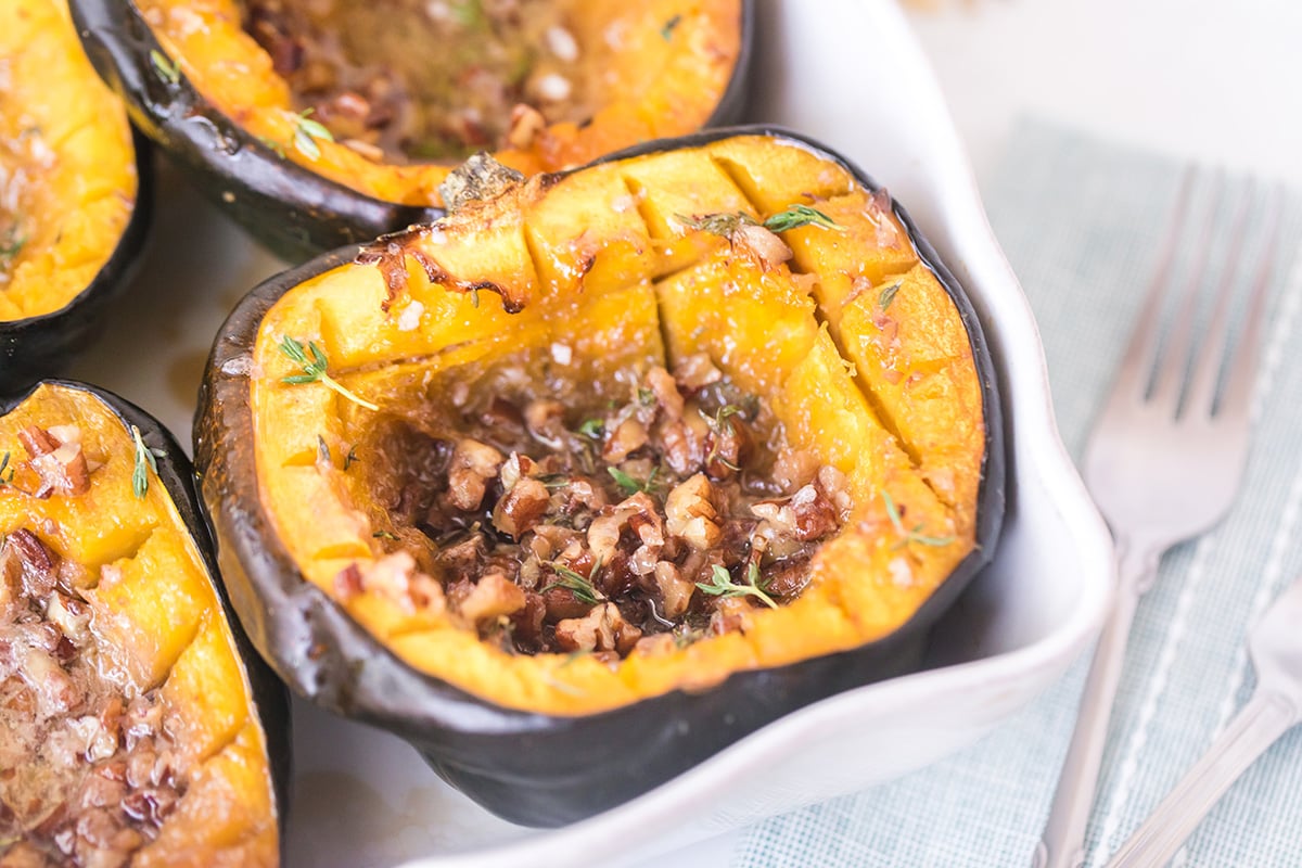 close up angled shot of pecan thyme acorn squash