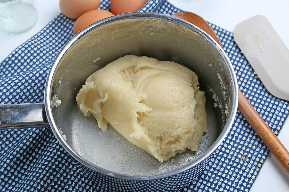 close up of churro dough in pan