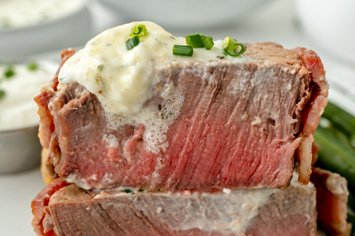 close up straight on shot of stack of two filet mignon halves