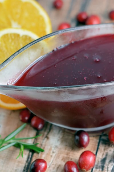 angled shot of bowl of cranberry syrup