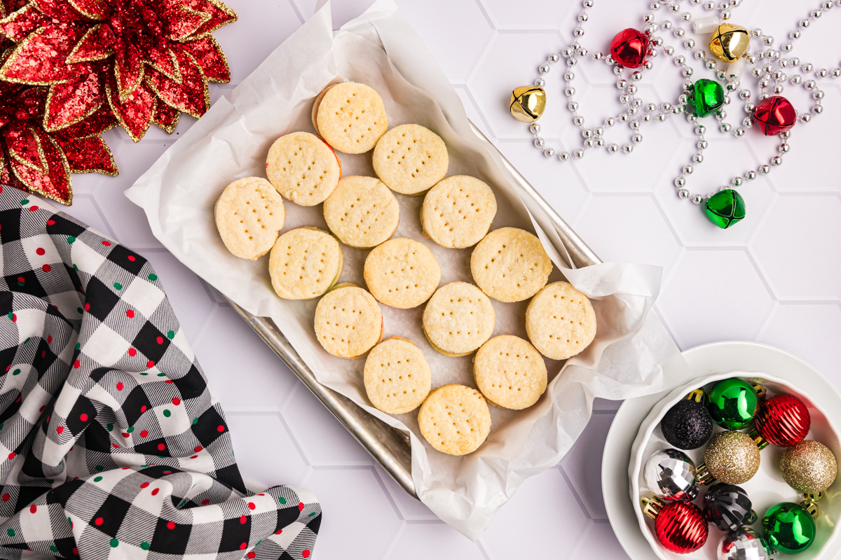 cream wafer cookies in parchment lined baking sheet