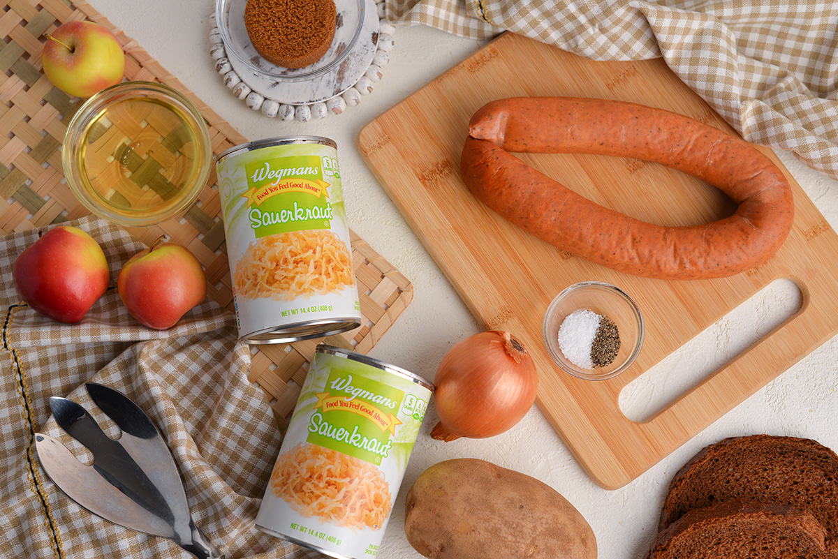 overhead shot of slow cooker sauerkraut and sausage ingredients