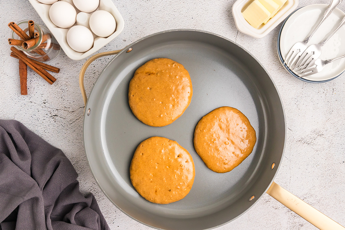 pancake batter in frying pan